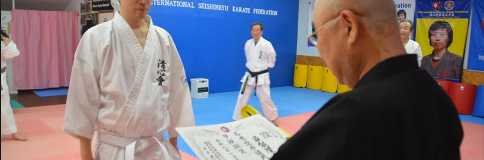 Dan certificate presentation at the headquarters dojo